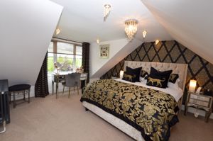Bedroom One- click for photo gallery